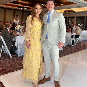 Yellow tiered ruffle maxi dress with long sleeves and slit